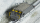 MEX 2253 000+L2 - RhB Ladegut Schotter für Selbstentladewagen 2-achsig 2253 nnn , grau - oben flach