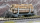 MEX 2264 000+L1 - RhB Ladegut Stammholz 1-teilig für 2-achsige Rungenwagen Bemo 2264 / 2284 , Naturmaterial