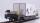 BEMO 2289 115 - RhB Sbk-v 7705 Containertragwagen 4-achsig, dunkelgrau - Beladung Container WAB 35 "Casty", weiss/bunt