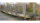 BEMO 9481 120 0m - RhB Sp-w 8360 Rungenwagen 4-achsig, hellgrau mit Doppelrungen - Beladung Stammholz