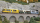 BEMO 7344 124 - RhB ABe 8/12 3514 "Steivan Brunies" Zweispannungs-Elektrotriebzug ZTZ "Allegra" 1./2. Klasse, bunt - "Ahnenzug" - DIGITAL mit SOUND, LIMITIERTE AUFLAGE, VbS 01.05.2024