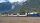 BEMO 9589 131 0m - RhB WRp 3831 Panoramawagen 4-achsig 2. Klasse, rot GEX - Servicewagen